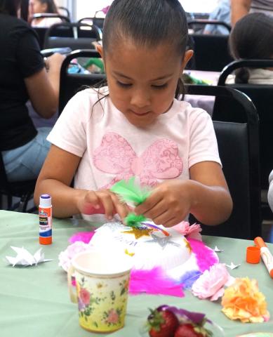 Delilah Cervantes works on a beautiful hat during the Mother’s Day celebration with her mom, Angelica Cervantes, at Soboba Tribal Preschool, May 8 Delilah Cervantes works on a beautiful hat during the Mother’s Day celebration with her mom, Angelica Cervantes, at Soboba Tribal Preschool, May 8