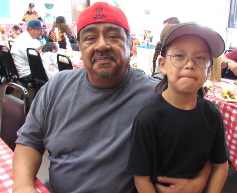Keith Escalante with his grandson Kyler at the preschool’s barbecue lunch event in honor of Father’s Day Keith Escalante with his grandson Kyler at the preschool’s barbecue lunch event in honor of Father’s Day