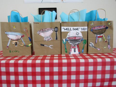 Students give decorated bags to their fathers, which are filled with one-of-a-kind handmade gifts Students give decorated bags to their fathers, which are filled with one-of-a-kind handmade gifts