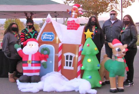 Tribal Council had a booth with goodies and raffle prizes during the Soboba Drive-thru Christmas Party on Dec. 12. From left, Executive Assistant to the Tribal Council Dione Kitchen, Vice-Chair Geneva Mojado, Treasurer Sally Ortiz, Sergeant at Arms Daniel Valdez and Secretary Monica Herrera Tribal Council had a booth with goodies and raffle prizes during the Soboba Drive-thru Christmas Party on Dec. 12. From left, Executive Assistant to the Tribal Council Dione Kitchen, Vice-Chair Geneva Mojado, Treasurer Sally Ortiz, Sergeant at Arms Daniel Valdez and Secretary Monica Herrera