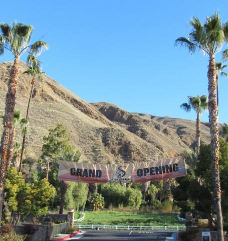 A banner at the Soboba Springs Golf Course entrance announces the opening of its 21-court pickleball facility A banner at the Soboba Springs Golf Course entrance announces the opening of its 21-court pickleball facility