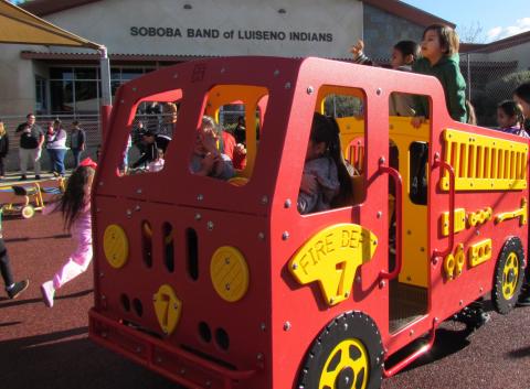 A multi-spring fire truck was a favorite among preschoolers when the new playground was opened for the first time on Monday A multi-spring fire truck was a favorite among preschoolers when the new playground was opened for the first time on Monday