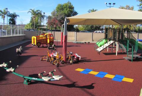 The upgraded playground at Soboba’s Tribal Preschool includes, clockwise from bottom right, a permanent hopscotch game, a four-seat tyke seesaw, Paulie Pony and toad spring riders, a multi-spring fire truck, an alligator balance beam and a deluxe grip climber that is part of the centrally located slides and other climbers. Tricycles can be ridden along the concrete perimeters of the 3,000 sq.ft. playground The upgraded playground at Soboba’s Tribal Preschool includes, clockwise from bottom right, a permanent hopscotch game, a four-seat tyke seesaw, Paulie Pony and toad spring riders, a multi-spring fire truck, an alligator balance beam and a deluxe grip climber that is part of the centrally located slides and other climbers. Tricycles can be ridden along the concrete perimeters of the 3,000 sq.ft. playground