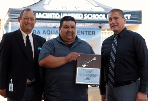 SJUSD School Board President John Norman, left, presented a recognition plaque to Soboba Tribal Council Vice Chairman Isaiah Vivanco and Tribal Administrator Michael Castello for the tribe’s $1 million contribution to the San Jacinto Unified School District to help fund a pool at the high school SJUSD School Board President John Norman, left, presented a recognition plaque to Soboba Tribal Council Vice Chairman Isaiah Vivanco and Tribal Administrator Michael Castello for the tribe’s $1 million contribution to the San Jacinto Unified School District to help fund a pool at the high school