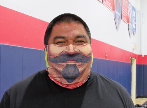Alfred Arviso dons a unique face covering while working at the Soboba Marketplace, a pop-up store that is open each Wednesday for tribal members and employees Alfred Arviso dons a unique face covering while working at the Soboba Marketplace, a pop-up store that is open each Wednesday for tribal members and employees