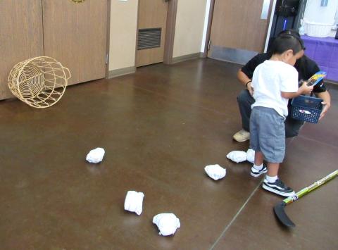 Nakashaway Tohee, 3, picks a prize after completing the diaper hockey game at the Soboba Tribal Preschool Nakashaway Tohee, 3, picks a prize after completing the diaper hockey game at the Soboba Tribal Preschool