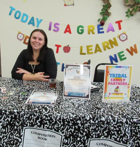 Ashley Sayers with Riverside-San Bernardino County Indian Health’s Tribal Family Partners shares free services available to Tribal members attending back-to-school night at the preschool Ashley Sayers with Riverside-San Bernardino County Indian Health’s Tribal Family Partners shares free services available to Tribal members attending back-to-school night at the preschool