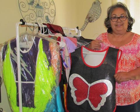 Gloria Vivanco with some of the many regalias she has created Gloria Vivanco with some of the many regalias she has created