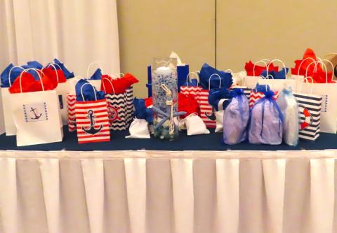 Many guests win opportunity drawing prizes as part of the celebration that boasted a nautical theme Many guests win opportunity drawing prizes as part of the celebration that boasted a nautical theme