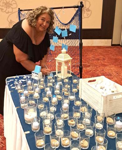 Soboba Foundation President Dondi Silvas is among those who wrote a message of hope and lit a candle during the cancer survivors and caregivers celebration dinner on July 29 Soboba Foundation President Dondi Silvas is among those who wrote a message of hope and lit a candle during the cancer survivors and caregivers celebration dinner on July 29