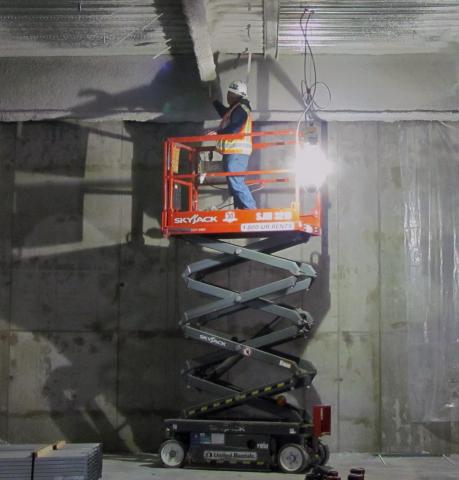 A third-party inspector prods the fireproofing spray to measure its thickness, making sure it meets code and specification requirements during construction of the replacement casino A third-party inspector prods the fireproofing spray to measure its thickness, making sure it meets code and specification requirements during construction of the replacement casino
