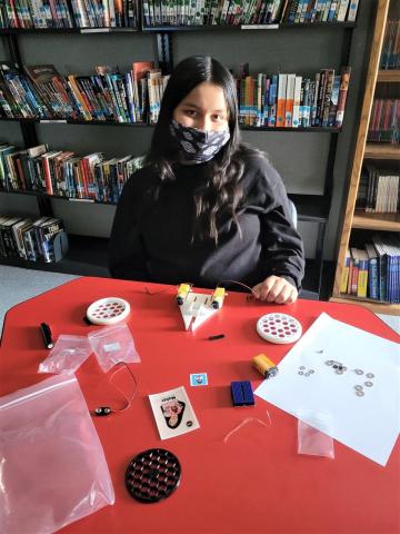 Noli Indian School 7th-grader Monique Russell assembles all the working parts of a robot she is ready to build during a recent STEM day at her school