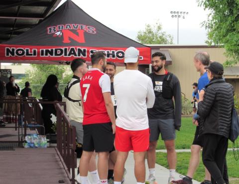 Runners visit while waiting for the start of the NATRO race at Noli Indian School, May 18 Runners visit while waiting for the start of the NATRO race at Noli Indian School, May 18