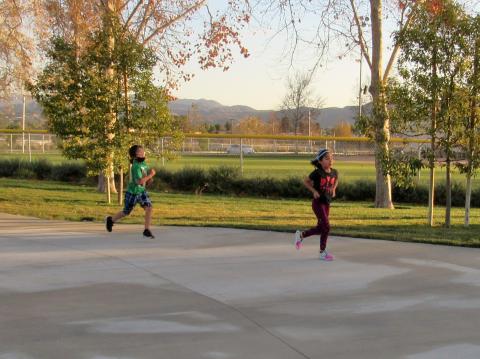 Suwoswush Resvaloso, 6, runs with Kali Red Fox, 7, during a recent practice of the Soboba team that is participating in this year’s Inter Tribal Sports’ Cross Country season Suwoswush Resvaloso, 6, runs with Kali Red Fox, 7, during a recent practice of the Soboba team that is participating in this year’s Inter Tribal Sports’ Cross Country season