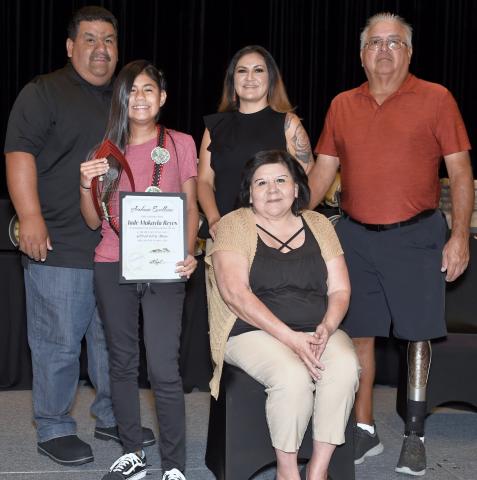 Jade Makayla Reyes earned a Platinum Certificate of Academic Excellence for maintaining a 4.0 GPA last school year. She was honored at Soboba’s Academic Achievement Awards Ceremony on July 28 at the Soboba Casino Resort Event Center. Congratulating her are Tribal Council members Isaiah Vivanco, Monica Herrera, Scott Cozart and Rose Salgado