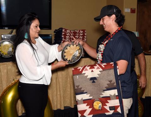 Soboba Tribal Council Secretary presents high school graduate Jeremy Knutzen with a handcrafted plate, blanket and lei during the annual Academic Achievement Awards Ceremony at The Country Club at Soboba Springs. Jeremy was also honored for his platinum status of earning a 4.197 GPA at Valley View High School in Moreno Valley. He will be majoring in finance this fall at the University of Texas, Dallas. Soboba Tribal Council Secretary presents high school graduate Jeremy Knutzen with a handcrafted plate, blanket and lei during the annual Academic Achievement Awards Ceremony at The Country Club at Soboba Springs. Jeremy was also honored for his platinum status of earning a 4.197 GPA at Valley View High School in Moreno Valley. He will be majoring in finance this fall at the University of Texas, Dallas.