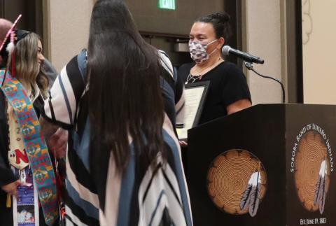 Noli Indian School Valedictorian Lanise Luna, left, was surprised with a Soboba Foundation scholarship during her commencement ceremony at the Soboba Casino Resort Event Center June 1