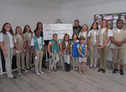 Isaiah Vivanco and Dondi Silvas from Soboba and local Girl Scouts stand on newly installed flooring at the Hemet Scout House. “Project Sparkle” was funded by Soboba’s annual charity golf tournament. Isaiah Vivanco and Dondi Silvas from Soboba and local Girl Scouts stand on newly installed flooring at the Hemet Scout House. “Project Sparkle” was funded by Soboba’s annual charity golf tournament.