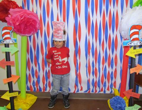 Tuukut Adame wears a Native American play on Dr. Seuss at the photo booth set up during a weeklong celebration of the famed children’s author at the Soboba Tribal Preschool Tuukut Adame wears a Native American play on Dr. Seuss at the photo booth set up during a weeklong celebration of the famed children’s author at the Soboba Tribal Preschool