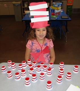 Noyaaykit Silvas counted and stacked cups that matched the hat she made to celebrate Dr. Seuss’ birthday at the Soboba Tribal Preschool on March 2 Noyaaykit Silvas counted and stacked cups that matched the hat she made to celebrate Dr. Seuss’ birthday at the Soboba Tribal Preschool on March 2
