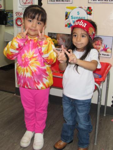 Laylah Robledo, left, and Paa’at Mariscal embrace the ‘60s and ‘70s during Decades Day at the Soboba Tribal Preschool, March 13 Laylah Robledo, left, and Paa’at Mariscal embrace the ‘60s and ‘70s during Decades Day at the Soboba Tribal Preschool, March 13
