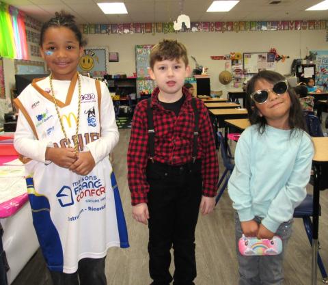 From left, Loovi Burton, Jensen Hamilton and Emilia Chapparosa celebrate Decades Day in their kindergarten classroom From left, Loovi Burton, Jensen Hamilton and Emilia Chapparosa celebrate Decades Day in their kindergarten classroom