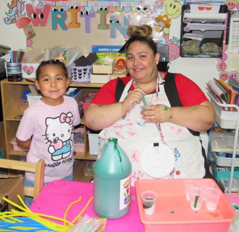 Avellaka Vega with kindergarten teacher Laura Aldrete, who had once aspired to be a professional artist Avellaka Vega with kindergarten teacher Laura Aldrete, who had once aspired to be a professional artist