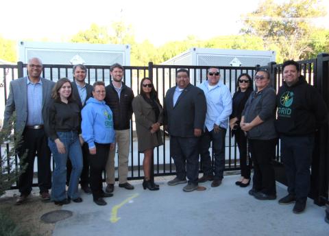 GRID Alternatives’ project team members meet with Soboba Tribal Council members and others near the installed Invinity flow batteries that have been installed at the Soboba Fire Station. From left, Jan Petrenko, Zoe Higgerson, Sean Anayah, Nicole Bloom, Dan Dumovich, Geneva Mojado, Isaiah Vivanco, Daniel Valdez, Monica Herrera, Kelli Hurtado and Jaime Alonso
