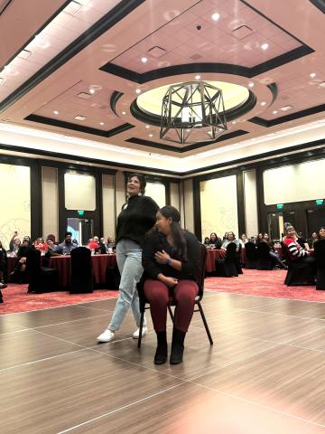 Soboba Tribal Preschool Administrator Lenora “Ponie” Mojado gets the final seat during an energetic Musical Chairs competition Soboba Tribal Preschool Administrator Lenora “Ponie” Mojado gets the final seat during an energetic Musical Chairs competition