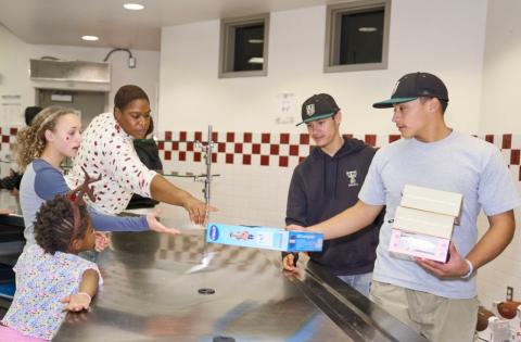 Volunteers at Tahquitz High School work on sorting all the toys by gender and age as they arrive inside the cafeteria during the Soboba Foundation’s annual Unstuff the Bus event, Dec. 12 Volunteers at Tahquitz High School work on sorting all the toys by gender and age as they arrive inside the cafeteria during the Soboba Foundation’s annual Unstuff the Bus event, Dec. 12