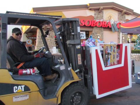 Soboba Maintenance Technician La France Givens helps transport toys from collection point to storage facilities near the Soboba Casino during this year’s Soboba Gives Back Toy Drive Soboba Maintenance Technician La France Givens helps transport toys from collection point to storage facilities near the Soboba Casino during this year’s Soboba Gives Back Toy Drive