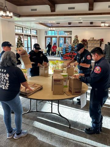 Members of Soboba Fire pitch in to unpack and sort toys at the Soboba Springs Golf Course, Dec. 8. Soboba Band of Luiseño Indians courtesy photo Members of Soboba Fire pitch in to unpack and sort toys at the Soboba Springs Golf Course, Dec. 8. Soboba Band of Luiseño Indians courtesy photo