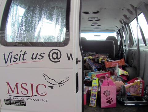 One of the vans from Mt. San Jacinto College was loaded with toys that will be distributed through the school’s chapter of the Phi Theta Kappa honor society to students who are in need One of the vans from Mt. San Jacinto College was loaded with toys that will be distributed through the school’s chapter of the Phi Theta Kappa honor society to students who are in need