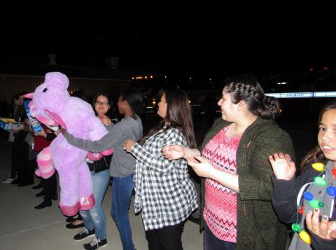 About 300 community members formed a human chain to pass along toys taken off a Soboba Band of Luiseño Indians’ bus during an annual event at the SJUSD warehouse About 300 community members formed a human chain to pass along toys taken off a Soboba Band of Luiseño Indians’ bus during an annual event at the SJUSD warehouse