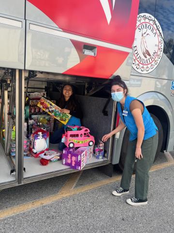 San Jacinto Walmart team members Bianka Rosas and Kiyana Castillos help load 1,000 toys into the cargo bay of the Soboba bus that will deliver toys to San Jacinto Unified School District’s warehouse, Dec. 5 San Jacinto Walmart team members Bianka Rosas and Kiyana Castillos help load 1,000 toys into the cargo bay of the Soboba bus that will deliver toys to San Jacinto Unified School District’s warehouse, Dec. 5