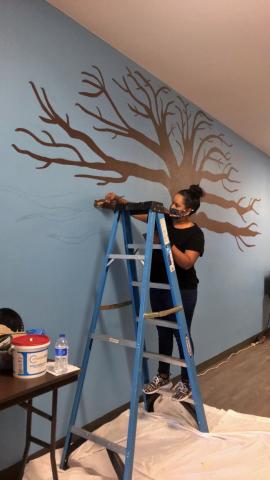 Lenora “Ponie” Mojado worked on the tree mural at Soboba Tribal Preschool several hours a week from August until late October. This month it was decorated with fall handprint “leaves” and Native American books to celebrate the fall season, Native American Heritage Month and literacy Lenora “Ponie” Mojado worked on the tree mural at Soboba Tribal Preschool several hours a week from August until late October. This month it was decorated with fall handprint “leaves” and Native American books to celebrate the fall season, Native American Heritage Month and literacy