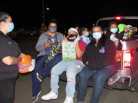 Bernadette Reynolds from Soboba DPS, at left, passed out candy to visitors at Soboba’s Tribal Trunk or Treat event at the Soboba Sports Complex on Saturday Bernadette Reynolds from Soboba DPS, at left, passed out candy to visitors at Soboba’s Tribal Trunk or Treat event at the Soboba Sports Complex on Saturday