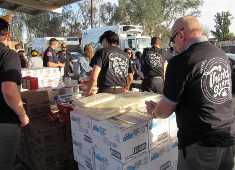 Volunteers stay busy loading up Thanksgiving Meal boxes for designated San Jacinto Unified School District families in need