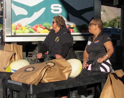 Soboba Foundation President Dondi Silvas, left, and Hemet-San Jacinto Vice Chair Patricia Scott wait to deliver a turkey meal to the next vehicle that drives through the Soboba Gives Back! event at San Jacinto High School, Nov. 17 Soboba Foundation President Dondi Silvas, left, and Hemet-San Jacinto Vice Chair Patricia Scott wait to deliver a turkey meal to the next vehicle that drives through the Soboba Gives Back! event at San Jacinto High School, Nov. 17