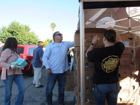 Soboba Tribal Council Treasurer Daniel Valdez, center, helps unload 20-plus pound frozen turkeys from boxes during the Soboba Gives Back! turkey meal giveaway at the Hemet Unified School District administration office, Nov. 16 Soboba Tribal Council Treasurer Daniel Valdez, center, helps unload 20-plus pound frozen turkeys from boxes during the Soboba Gives Back! turkey meal giveaway at the Hemet Unified School District administration office, Nov. 16