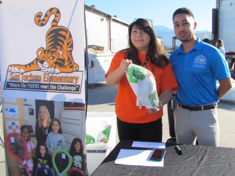 San Jacinto Unified School District Liaisons Nelida Gonzalez and Giovanni Hernandez were happy to greet families who traded a voucher for a turkey during the Soboba Foundation’s turkey distribution event on Nov. 23 San Jacinto Unified School District Liaisons Nelida Gonzalez and Giovanni Hernandez were happy to greet families who traded a voucher for a turkey during the Soboba Foundation’s turkey distribution event on Nov. 23