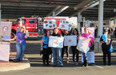 Representatives from San Jacinto Unified School District schools send enthusiastic Happy Thanksgiving greetings to families as vehicles drive through to receive a turkey and all the trimmings on Nov. 17 Representatives from San Jacinto Unified School District schools send enthusiastic Happy Thanksgiving greetings to families as vehicles drive through to receive a turkey and all the trimmings on Nov. 17