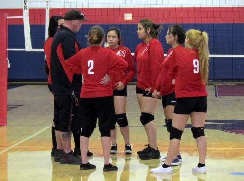Assistant Coach Brian Savage gives the volleyball team a pep talk before their first game at home on Aug. 21 Assistant Coach Brian Savage gives the volleyball team a pep talk before their first game at home on Aug. 21