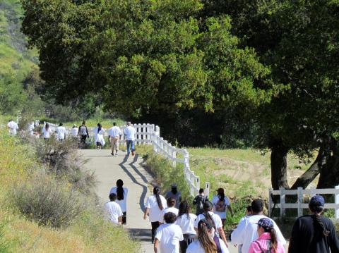 About 100 participants traveled from the Old Tribal Hall to The Oaks on the Soboba Indian Reservation during the Elders/Youth and War on Drugs Walk on March 25 About 100 participants traveled from the Old Tribal Hall to The Oaks on the Soboba Indian Reservation during the Elders/Youth and War on Drugs Walk on March 25