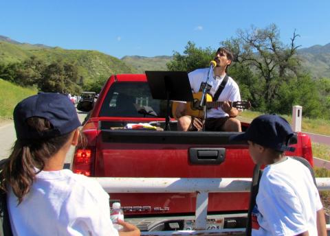 Joseph Dence sings worship songs for those who chose to ride the shuttle during the annual Elders/Youth Walk, combined this year with the War on Drugs Walk at the Soboba Indian Reservation Joseph Dence sings worship songs for those who chose to ride the shuttle during the annual Elders/Youth Walk, combined this year with the War on Drugs Walk at the Soboba Indian Reservation