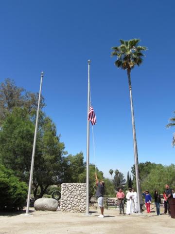 Veteran Richard VanDyke-Parker raises the American flag to full staff as part of the Memorial Day ceremony at Soboba Cemetery Veteran Richard VanDyke-Parker raises the American flag to full staff as part of the Memorial Day ceremony at Soboba Cemetery